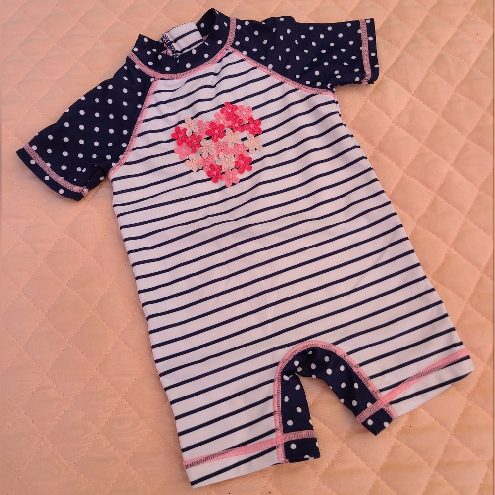 Rash guard style swimsuit for baby girl by Little Me, size 6-9 months